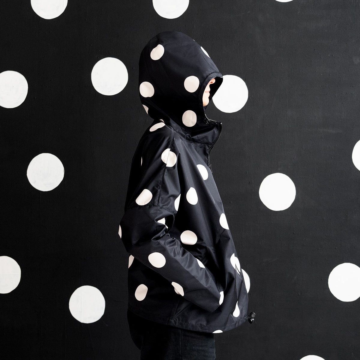 BLACK AND WHITE POLKA RAINCOAT