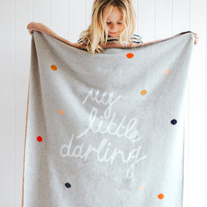 Small Darling Baby Throw. Blonde girl holding blanket
