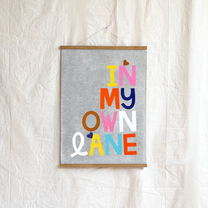 IN MY OWN LANE ART TEATOWEL