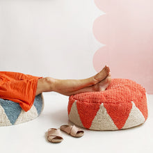 Watermelon Circus Floor Cushion. Person with feet up relaxing. Sandals on floor